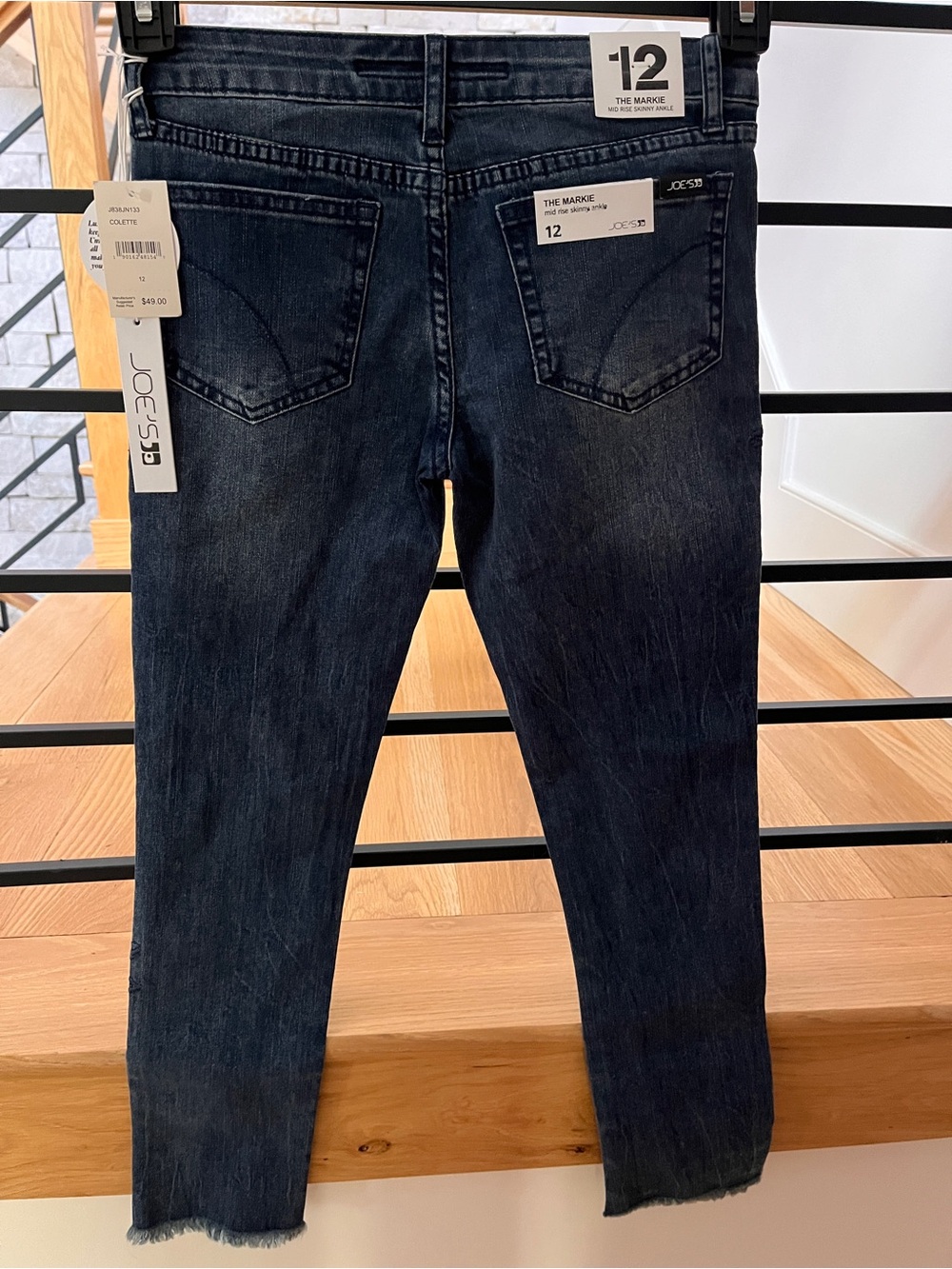 NWT Joe's Jeans girls size 12. Dark blue, slim with embroidered flowers.